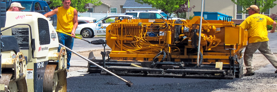 picture of a crew paving some asphalt